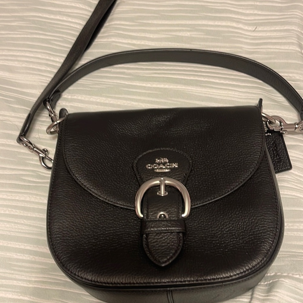 Small Coach crossbody. 8 1/2” ht X 9” width